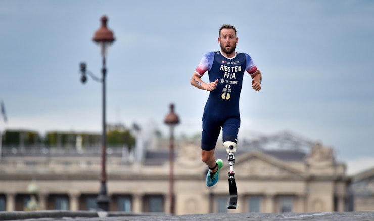 Which men have secured Paralympic qualification slots for Paris?