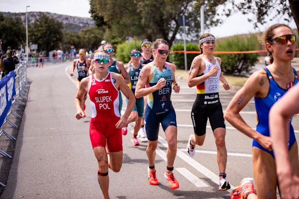 Who earned the Paris Olympic Triathlon New Flag places?